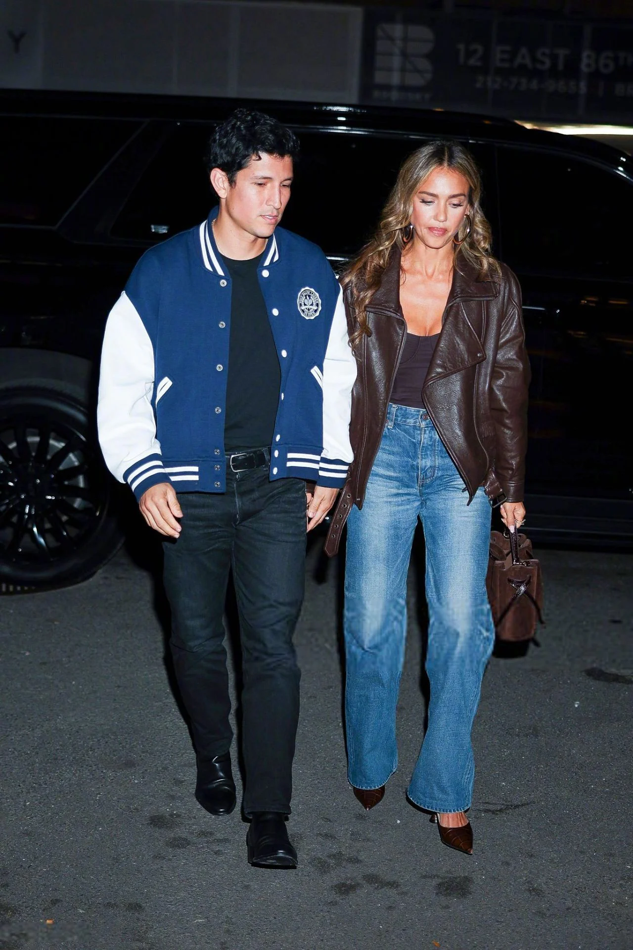 Urban Chic with Varsity and Leather Jackets, Blue Jeans, and Complementary Accessories