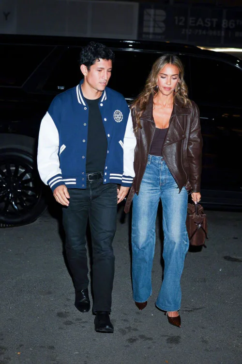 Urban Chic with Varsity and Leather Jackets, Blue Jeans, and Complementary Accessories