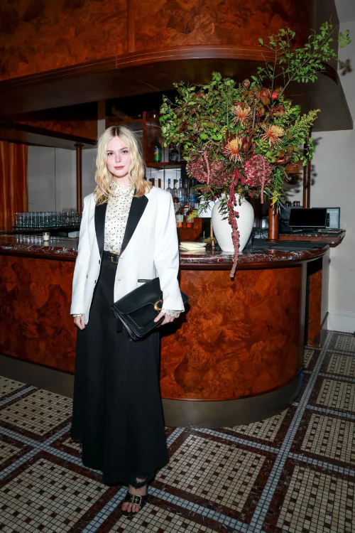 Elegant Black and White Contrast with a Classic Blazer and Polka-Dot Blouse