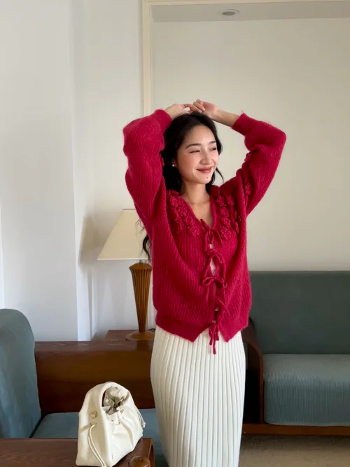 Cozy Red Knit Cardigan Paired with Elegant White Pleated Skirt