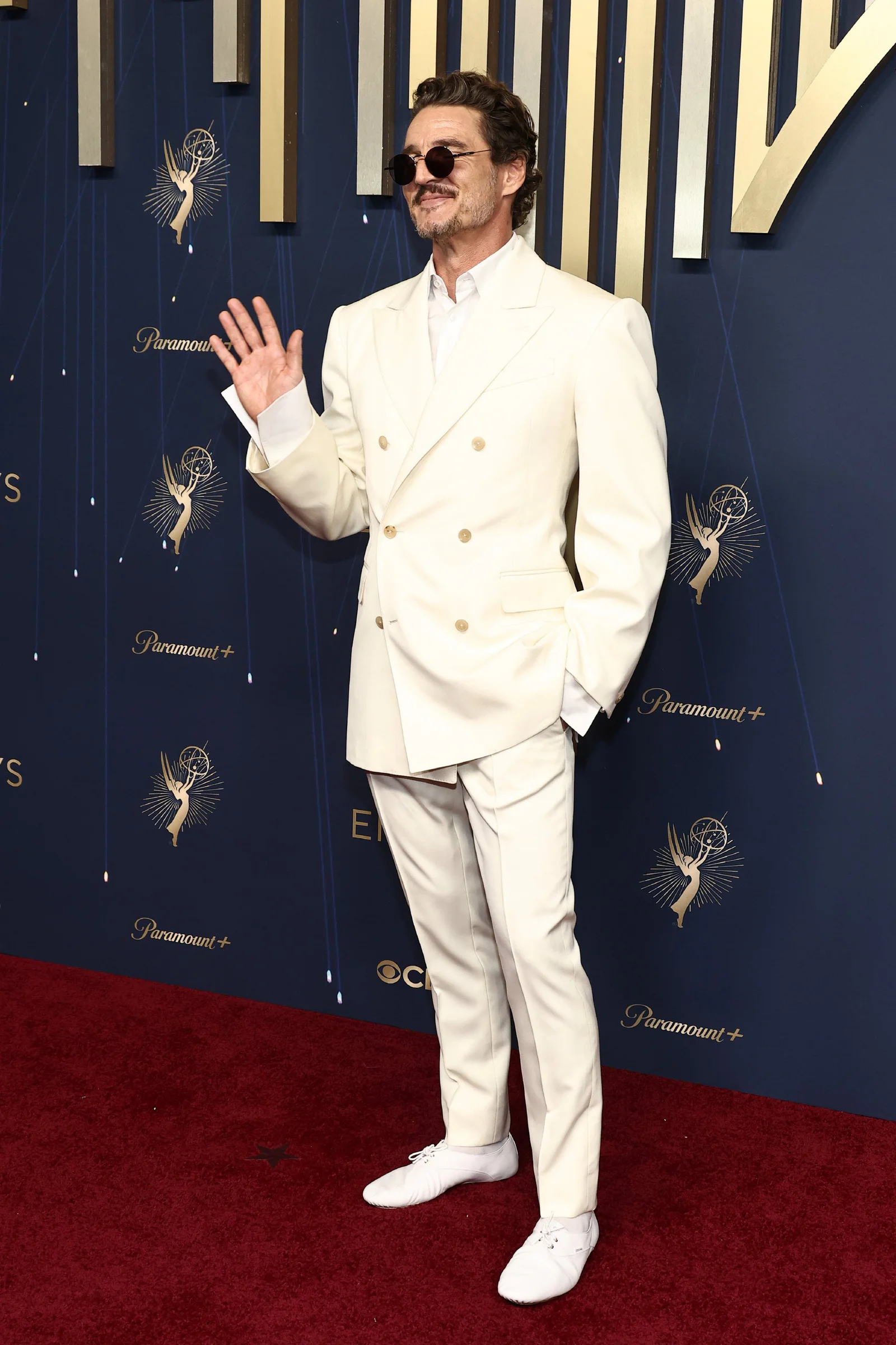 Crisp White Double-Breasted Suit with Gold Accents and Casual Sneakers