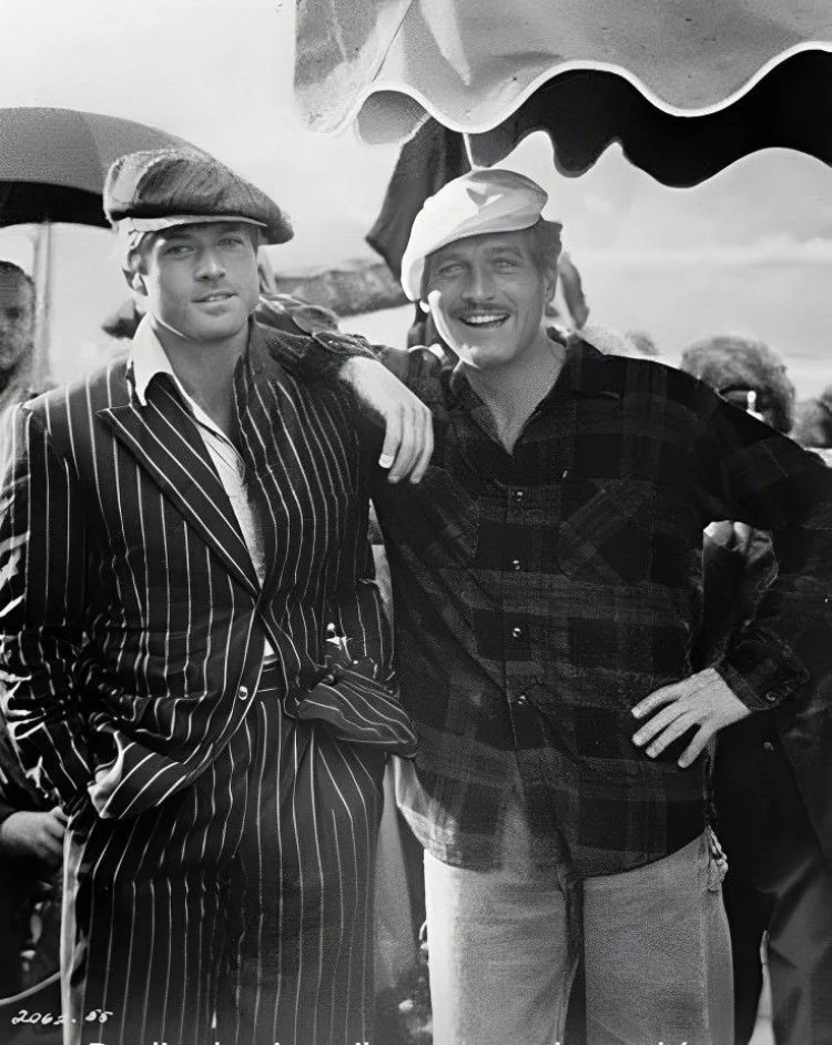 Classic Pinstripe Suit with a Vintage Flat Cap: A Timeless Blend of Elegance and Casual Charm