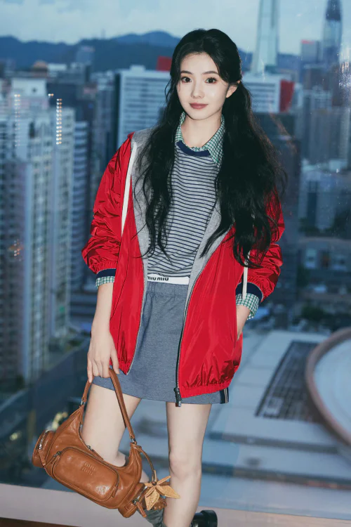 Bold Red Jacket with Striped and Checked Layers for a Sporty Chic Look