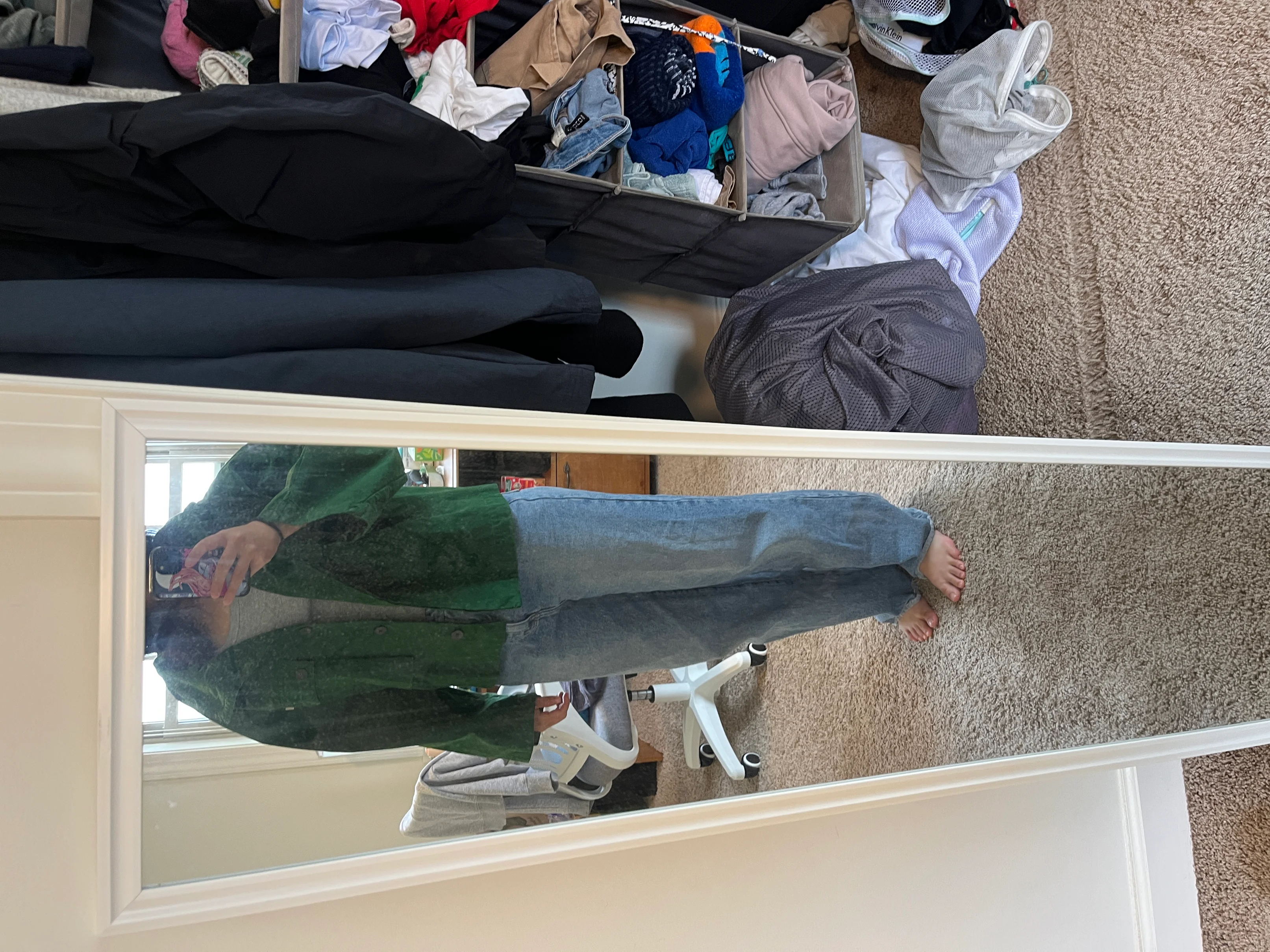 Casual Green and Blue Ensemble with Loose-Fit Jeans and Jacket