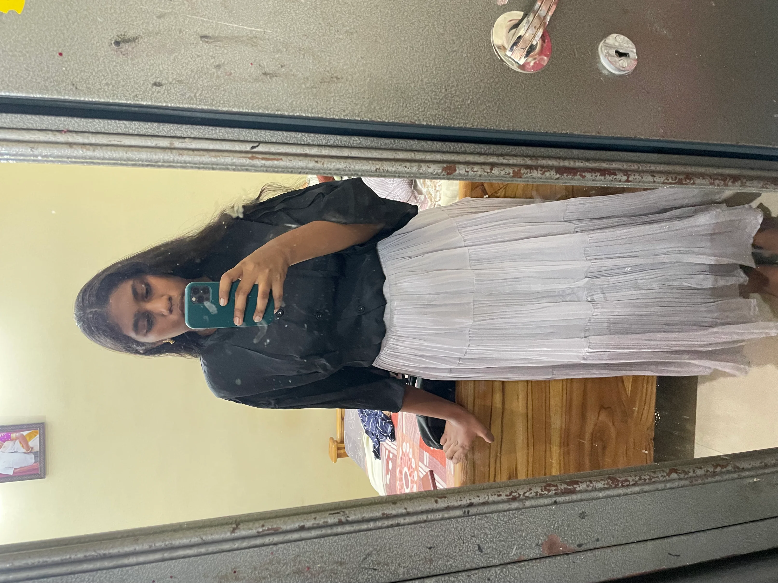 Elegant Black Blouse with White Pleated Skirt for Classic Style