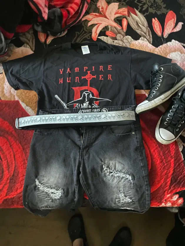 Edgy Punk Style with Graphic Tee, Distressed Shorts, and High-Top Sneakers