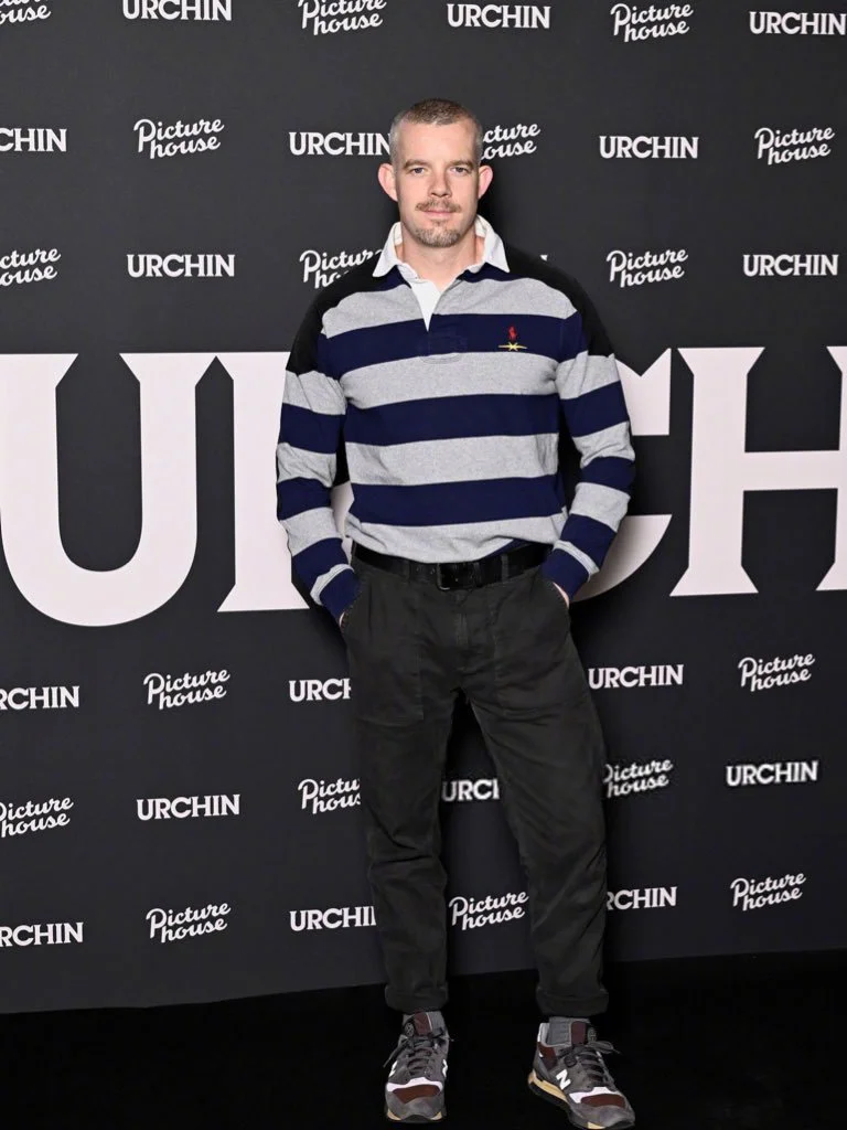Casual Style with Striped Rugby Shirt and Dark Trousers