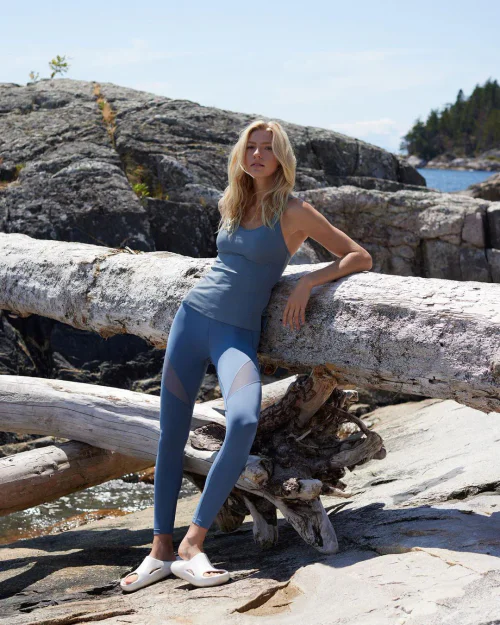 Stylish Blue Activewear Ensemble with White Slides for Casual and Athletic Outings