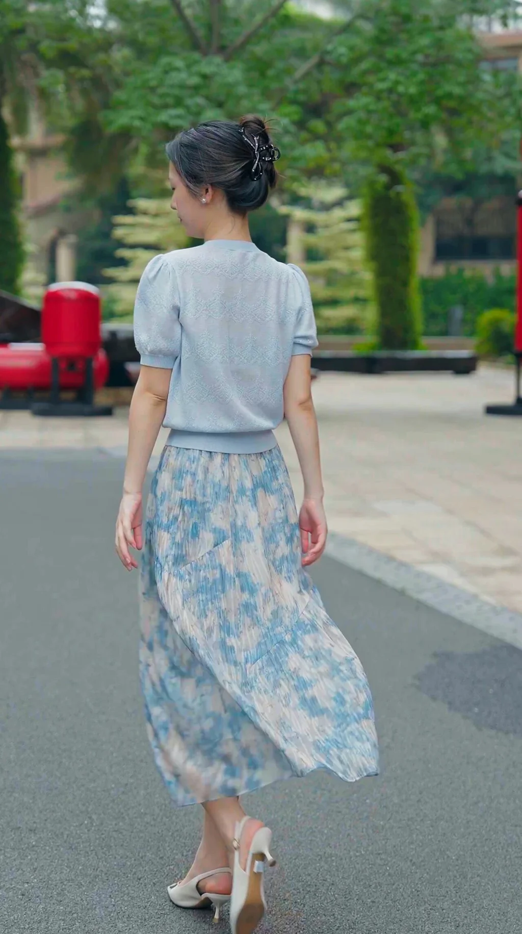 Elegant Pastel Blue Top and Floral Skirt Ensemble for a Sophisticated Daytime Look
