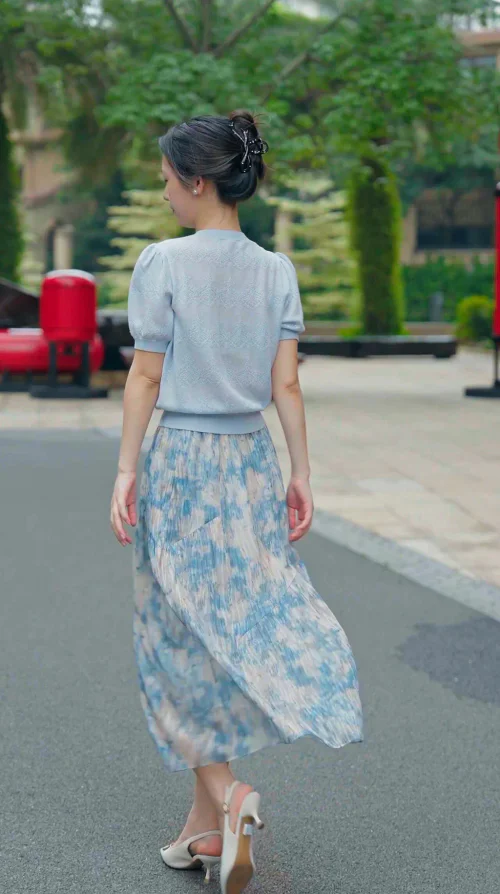 Elegant Pastel Blue Top and Floral Skirt Ensemble for a Sophisticated Daytime Look