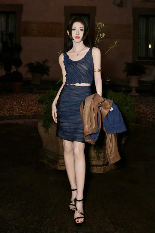 Elegant Navy Ruched Dress with Brown Leather Jacket and Black Strappy Heels