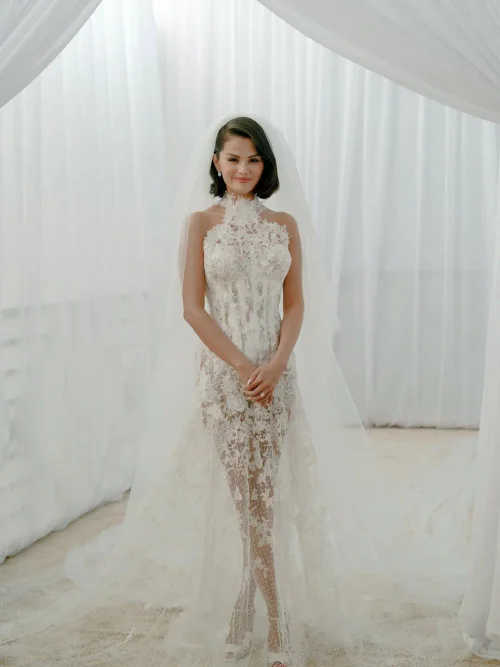 Selena Gomez's Wedding Dress. Exquisite Lace Bridal Gown with High Neckline and Elegant Train