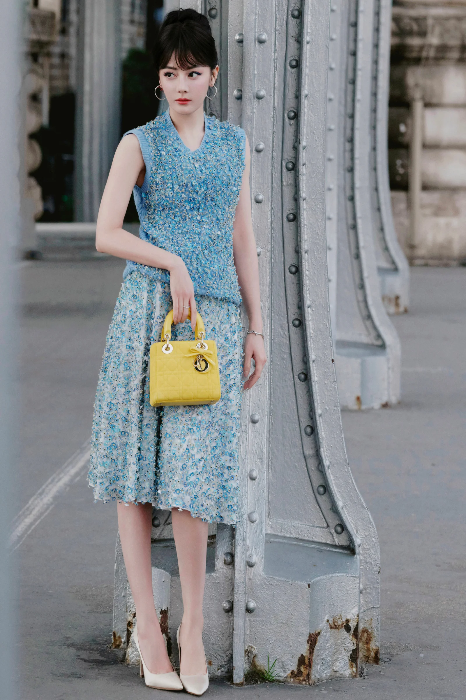 Elegant Blue Ensemble with Yellow Accent and Nude Heels
