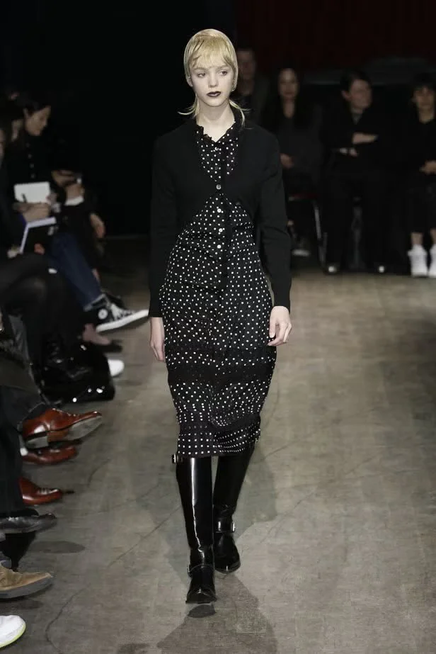 Elegant Polka Dot Dress with Black Cardigan and Knee-High Boots