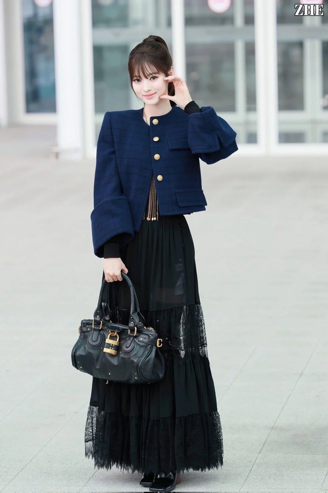Navy Blazer with Black Lace Skirt and Structured Handbag Ensemble
