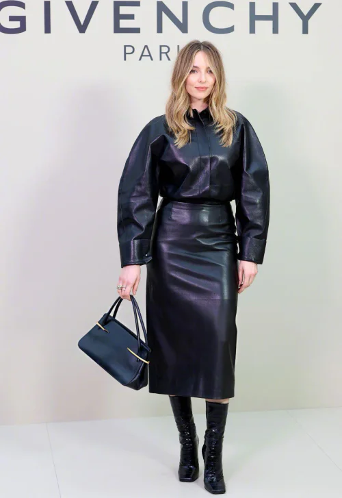 Chic All-Black Leather Ensemble with Oversized Sleeves and Knee-High Boots
