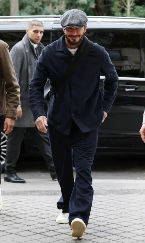 Classic Navy Ensemble with Vintage Accents and Modern Sneakers