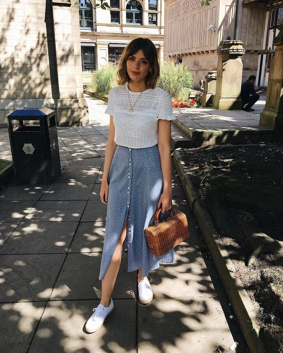 Casual Summer Style: White Crocheted Top with Blue Button-Front Skirt