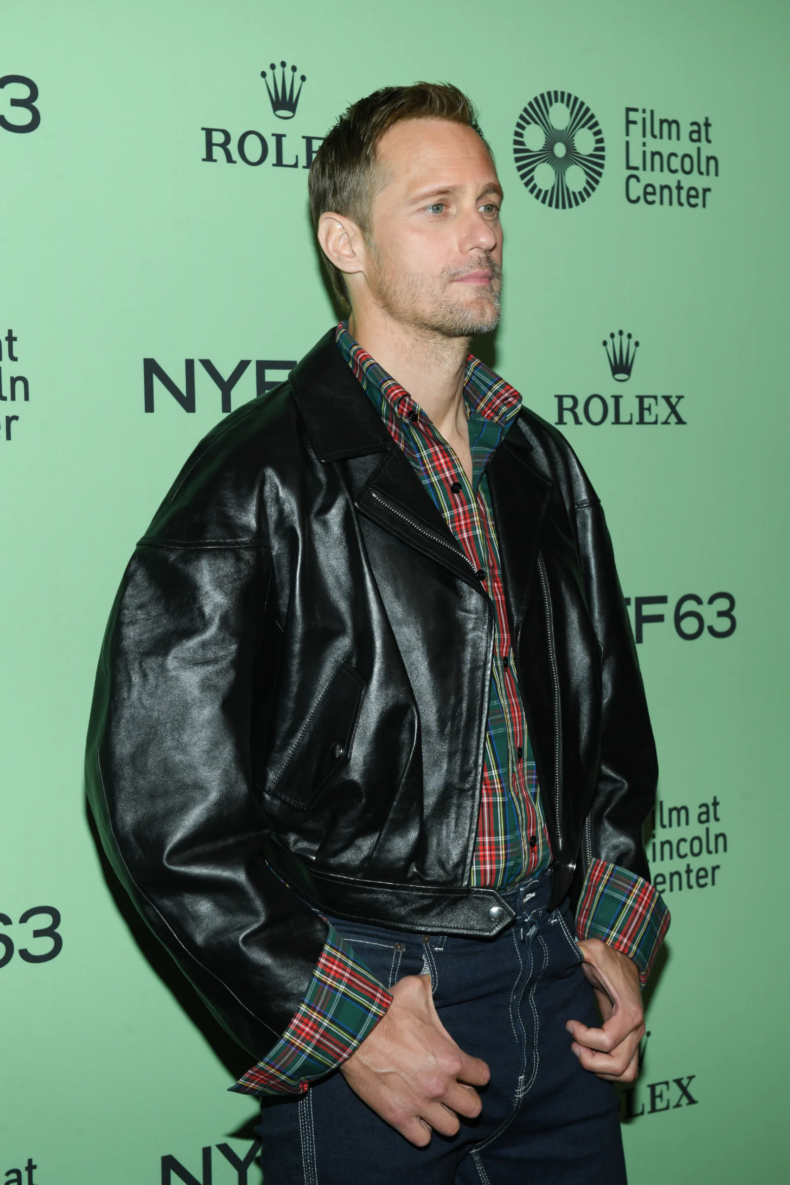 Bold Black Leather and Plaid Shirt Fusion with Contrasting Details