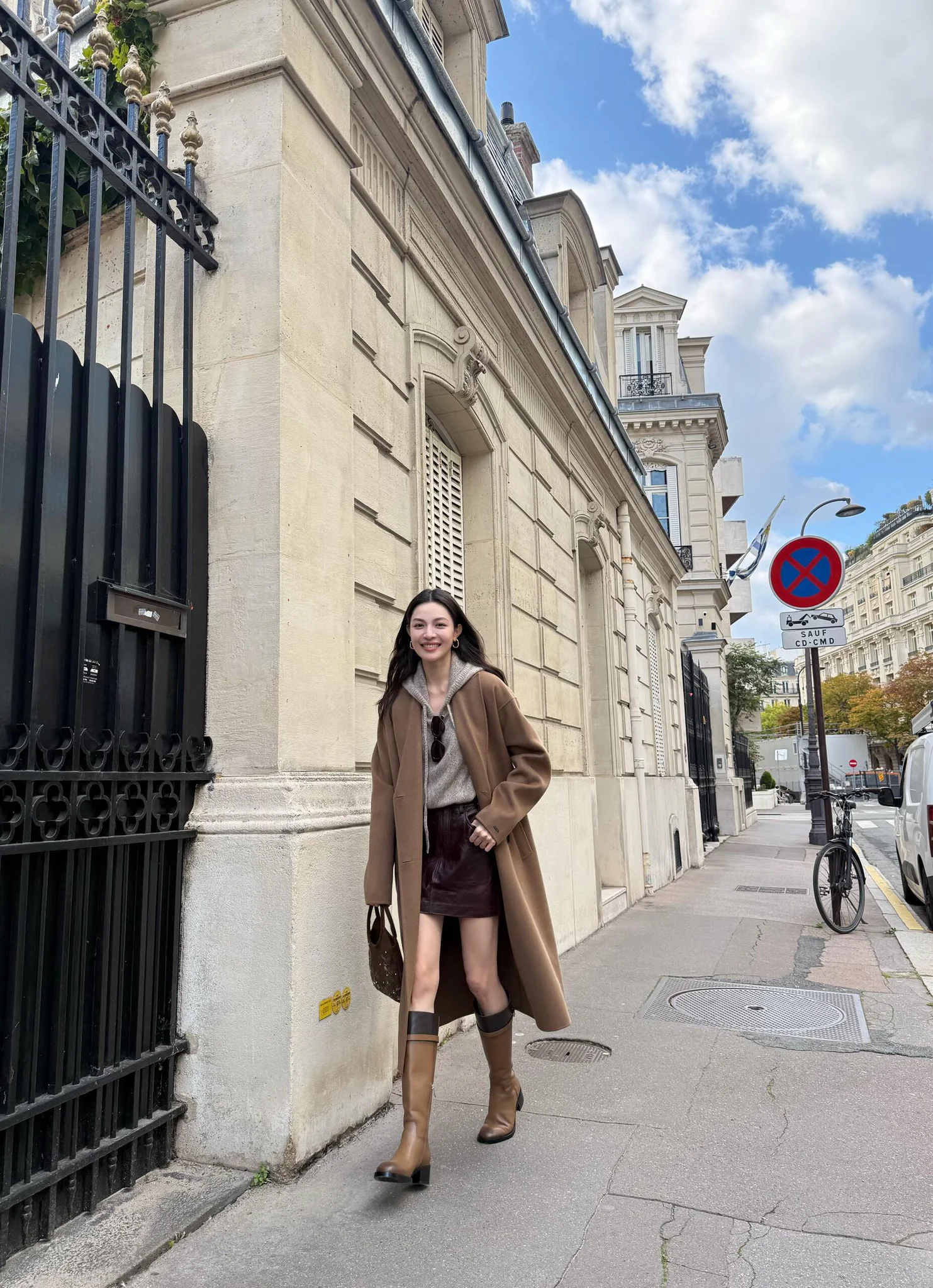 Chic Camel Coat with Knee-High Boots and Brown Shorts Ensemble