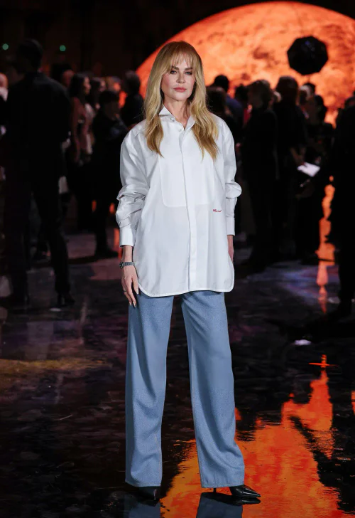 Nicole Kidman in Chanel. Effortlessly Chic: Oversized White Shirt with Light Blue Trousers and Black Shoes