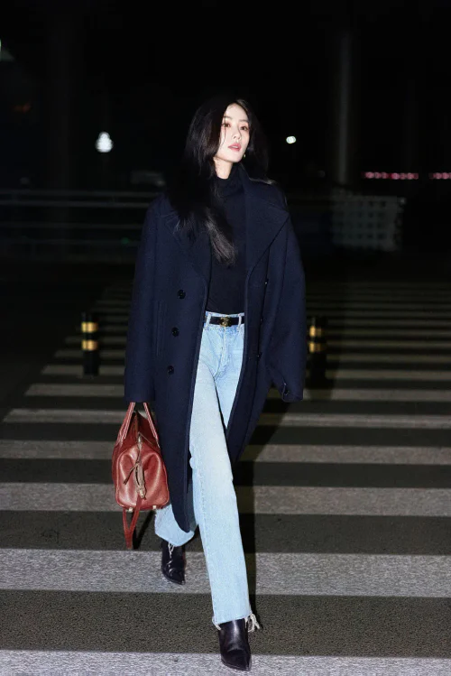 Elegant Navy Overcoat with Casual Denim and Accessories for a Chic Evening Look