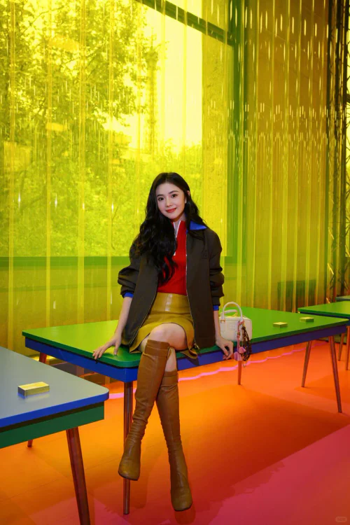 Bold Color Coordination with Red and Mustard Accents and Knee-High Boots