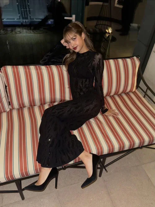 Lisa in black see-through Dress. Elegant Sheer Black Dress with Subtle Pattern and Classic Heels