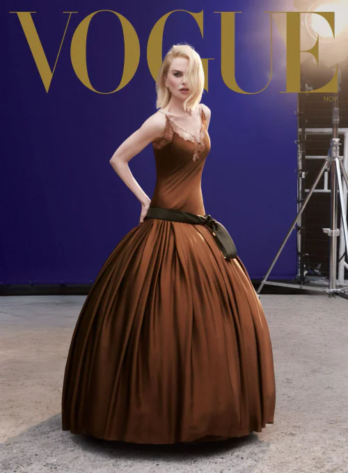 Nicole Kidman! Elegant Brown Ball Gown with Lace Detailing and Black Belt for a Classic Formal Look