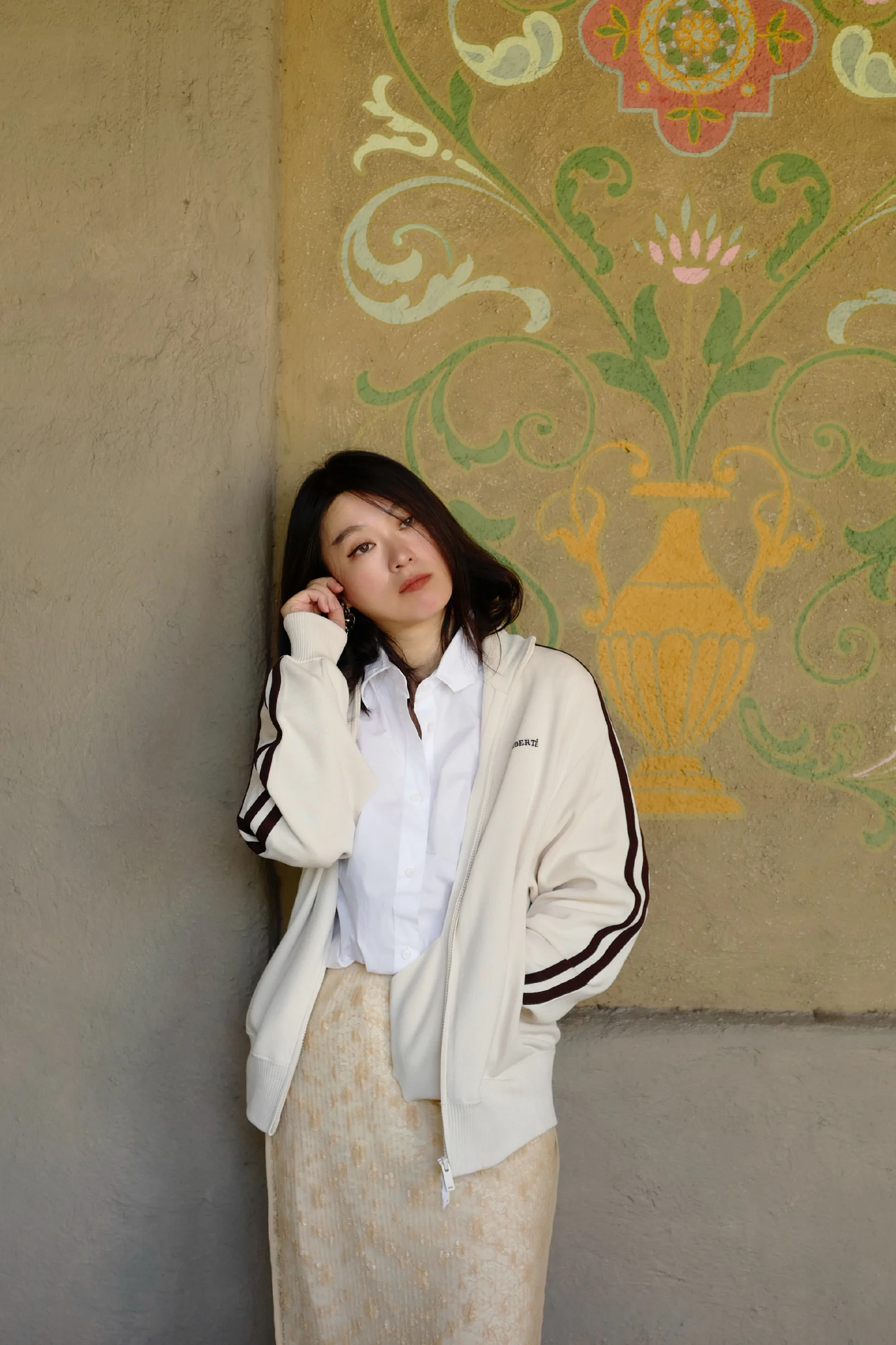 Casual Chic Meets Classic Elegance with Cream Hoodie and Beige Skirt