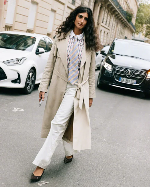 Elegant Beige Trench Coat with Striped Shirt and Tie Ensemble