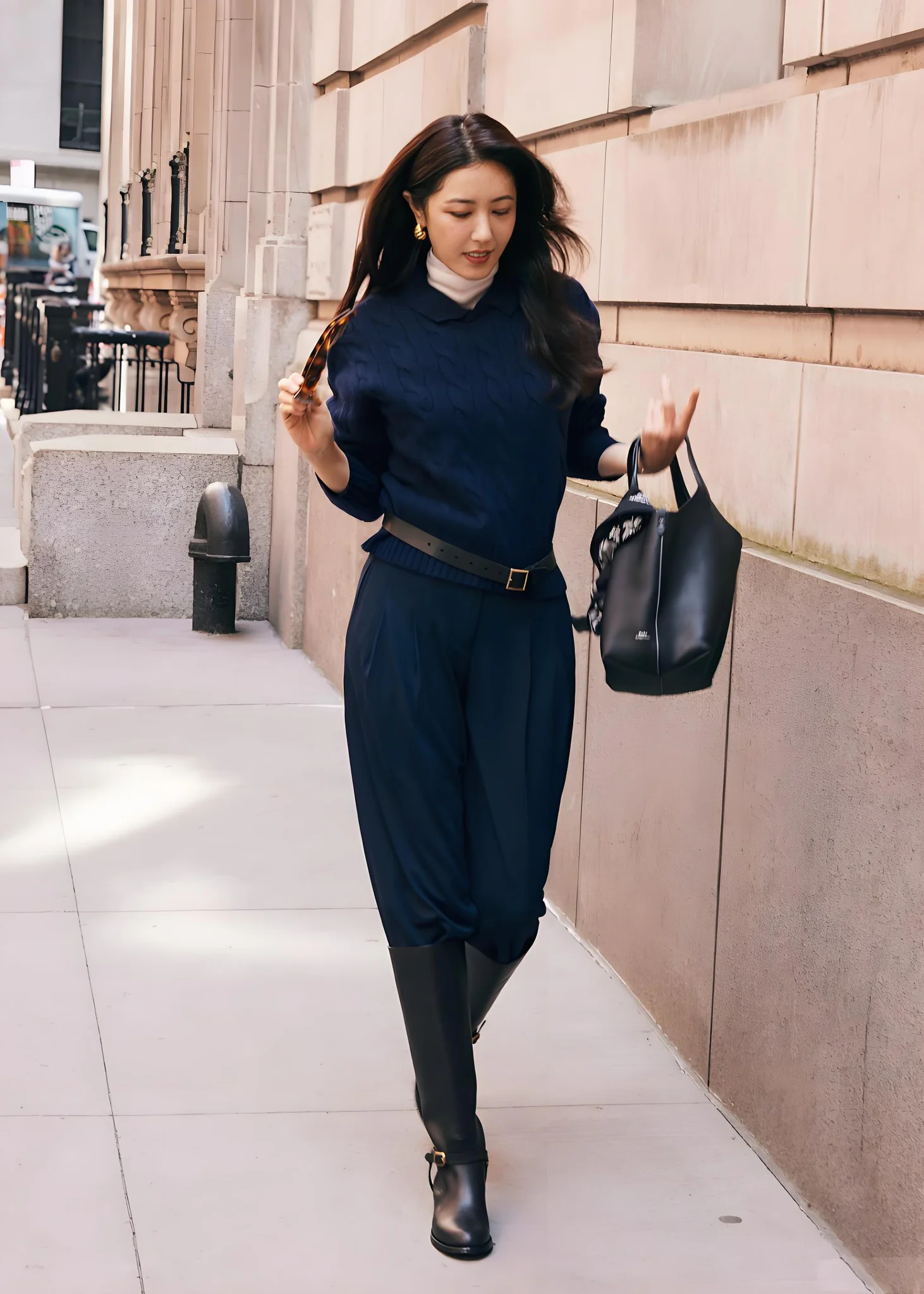 Elegant Monochrome Look with Navy Sweater, Trousers, and Black Accessories