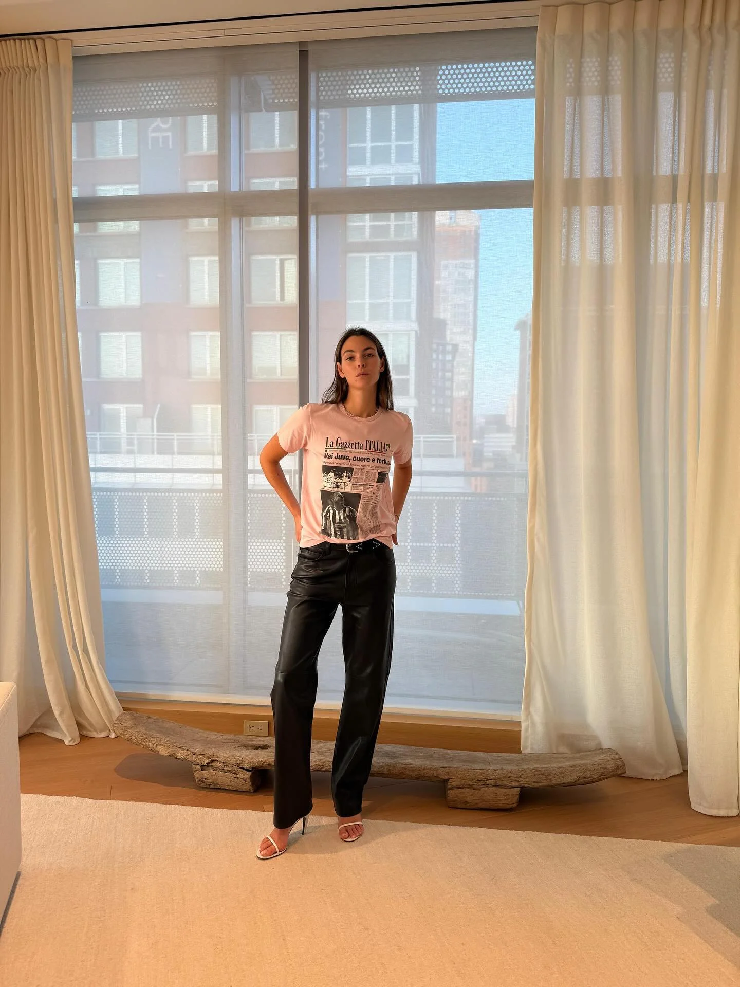 Stylish Graphic Tee and Tailored Black Trousers with Chic White Heels