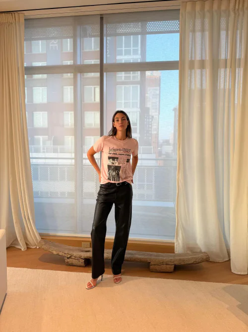 Stylish Graphic Tee and Tailored Black Trousers with Chic White Heels