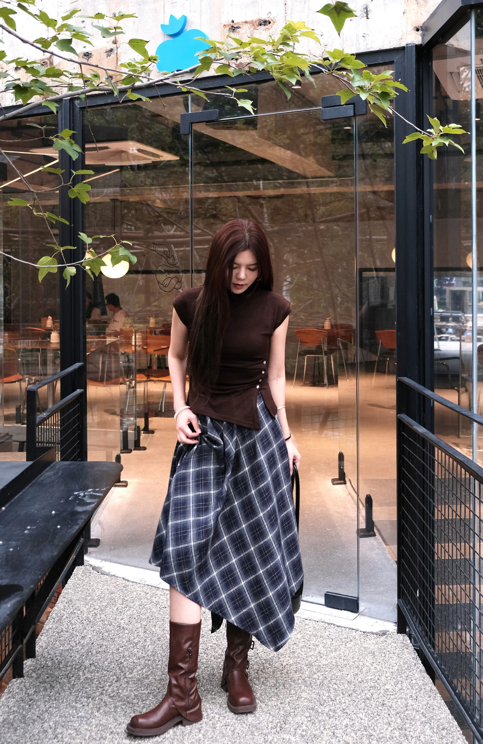 Modern Assymetrical Ensemble with Earthy Tones and Plaid Skirt