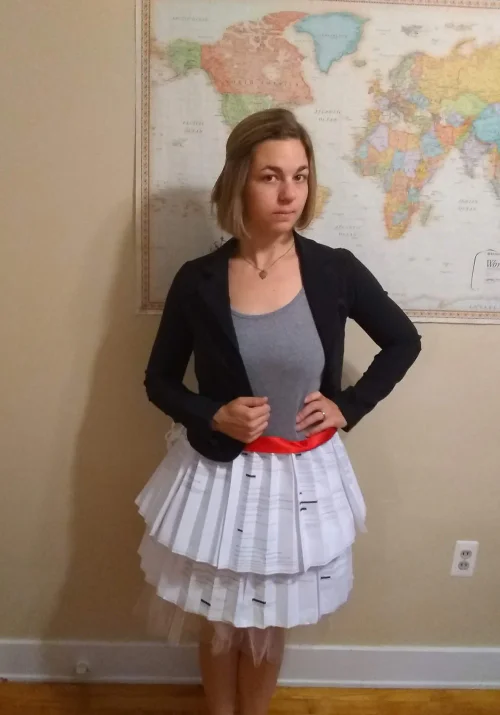 Creative Mixed-Style Outfit with Black Blazer and Sheet Music Skirt