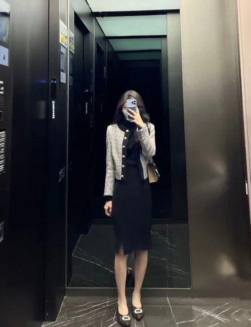 Classic Black Dress with Tweed Jacket and Embellished Flats for an Elegant Look