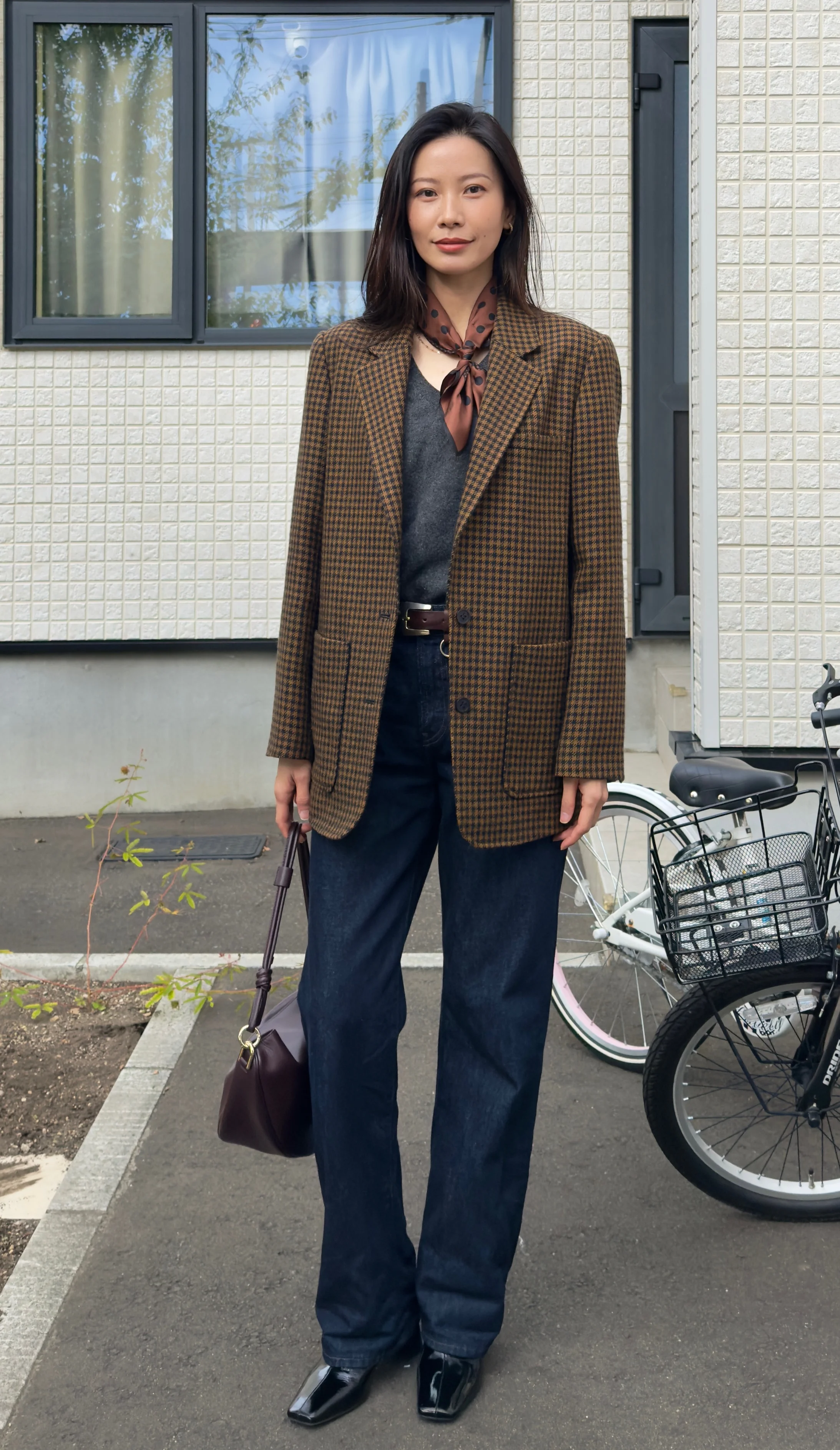 Classic Brown Check Blazer with Wide-Leg Jeans and Elegant Silk Scarf Styling