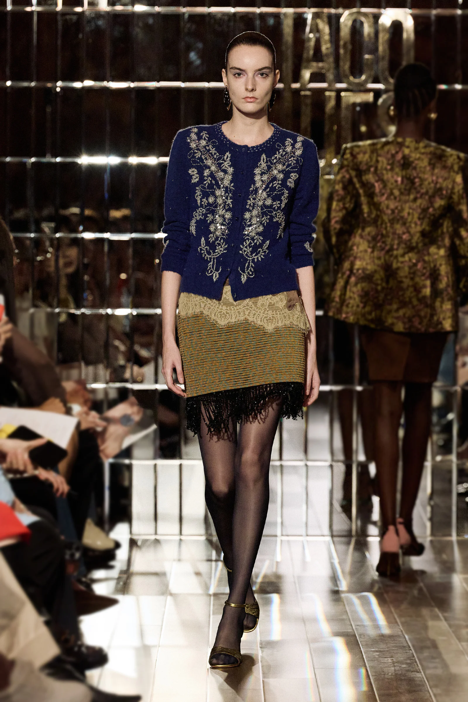 Bold Embroidered Blue Sweater with Textured Earth-Tone Fringe Skirt