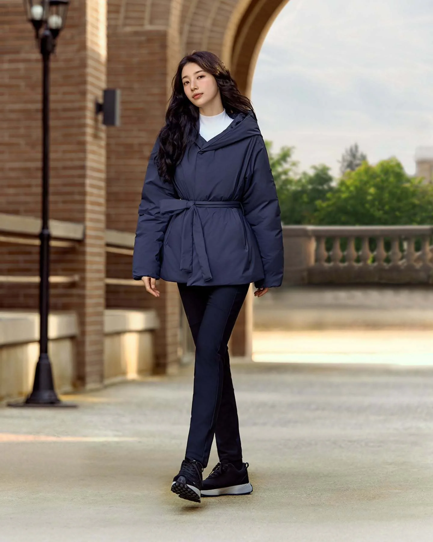 Chic Urban Style with Dark Puffer Coat and Leggings
