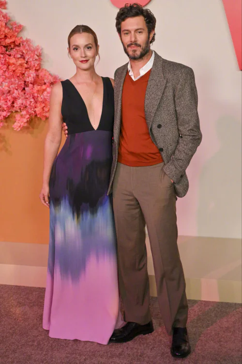 Adam Brody & Leighton Meester. Elegant Gradient Dress Paired with Classic Layers in Warm Tones