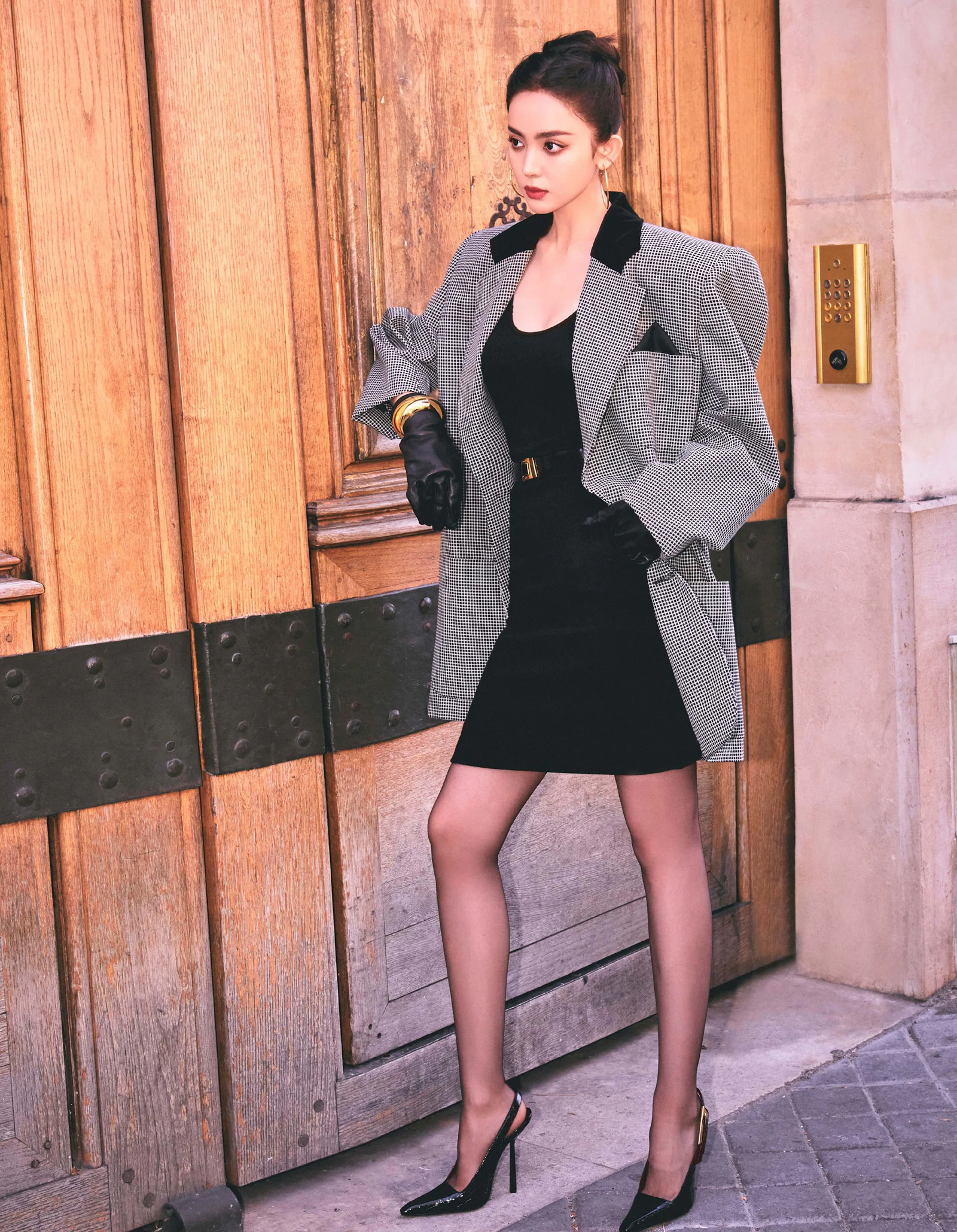Chic Black Dress with Houndstooth Blazer and Gold Accents for a Sophisticated Look