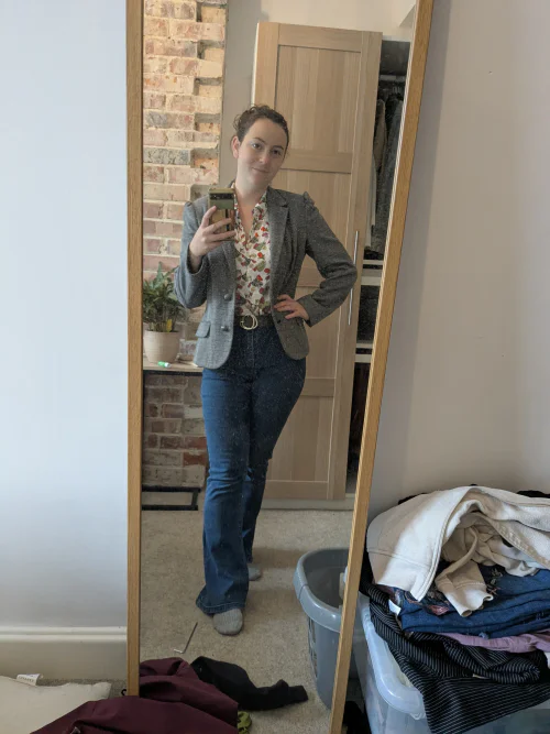 Gray Blazer and Floral Blouse with Jeans for a Smart-Casual Look