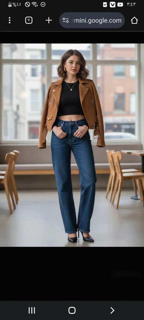 Cropped Black Top Meets Tan Leather Jacket and High-Waisted Jeans for Confused Chic