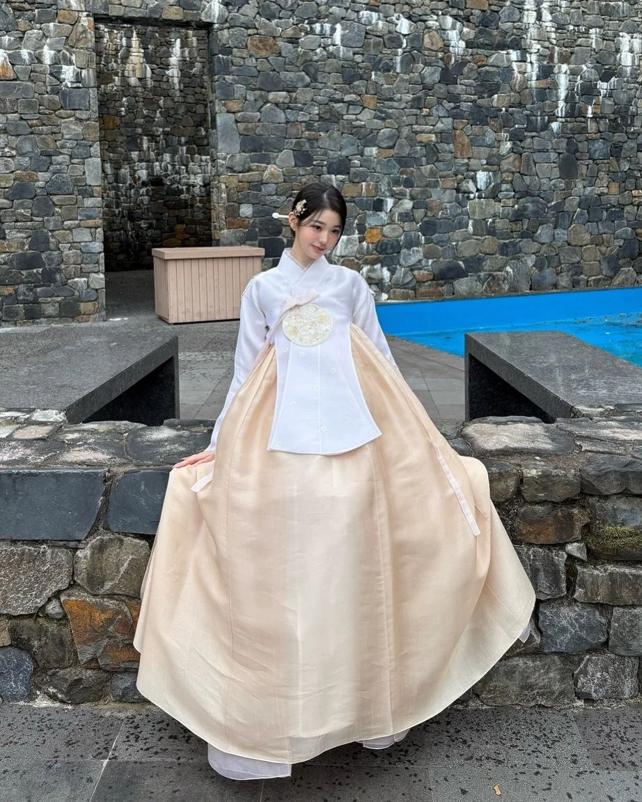 Jang Wonyoung in Traditional White and Cream Hanbok with Elegant Accessories