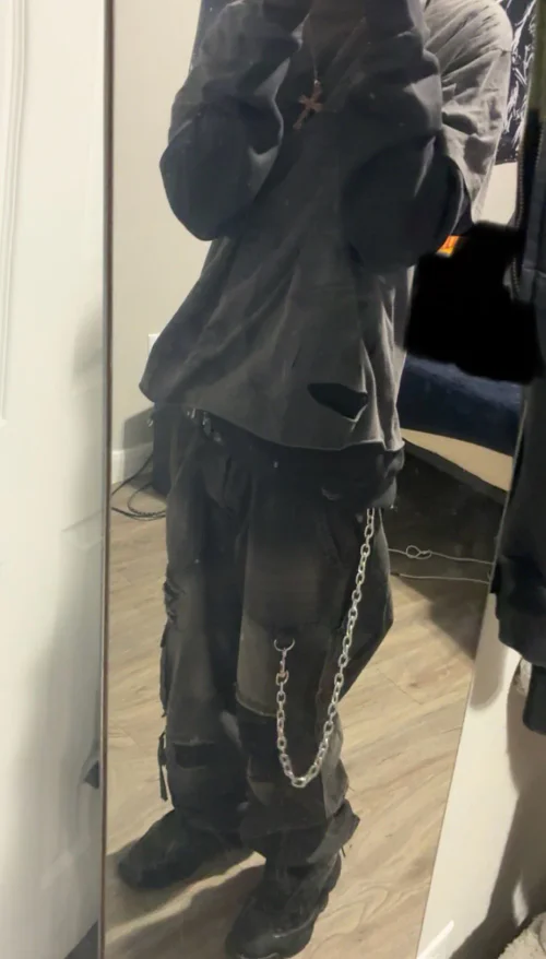 Edgy Streetwear: Distressed Top and Cargo Pants with Chain Details