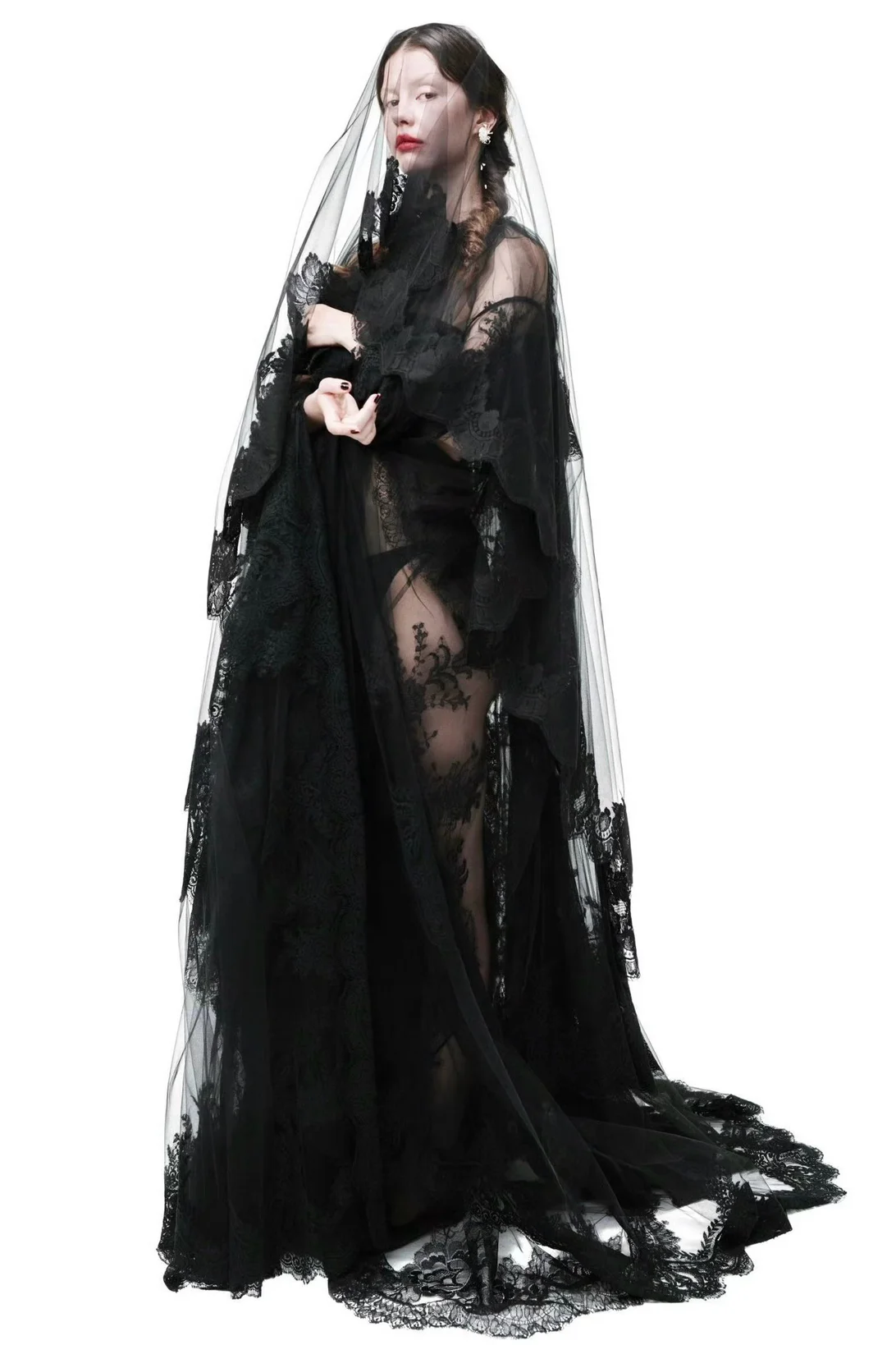 Mia Goth photographed by Willy Vanderperre. Gothic Glam Misstep: Black Lace and Veil Ensemble Misses the Mark