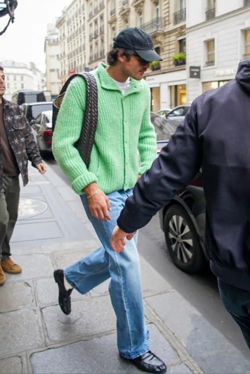 Jacob Elordi's Casual Street Style with Mint Green Sweater and Light-Wash Jeans