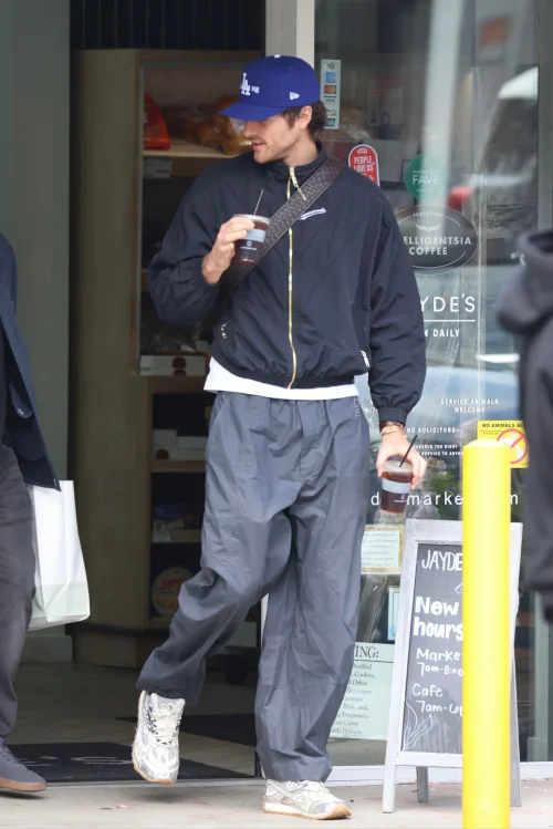 Jacob Elordi's OOTD Rate: Casual Streetwear Style with Track Jacket and Distressed Sneakers