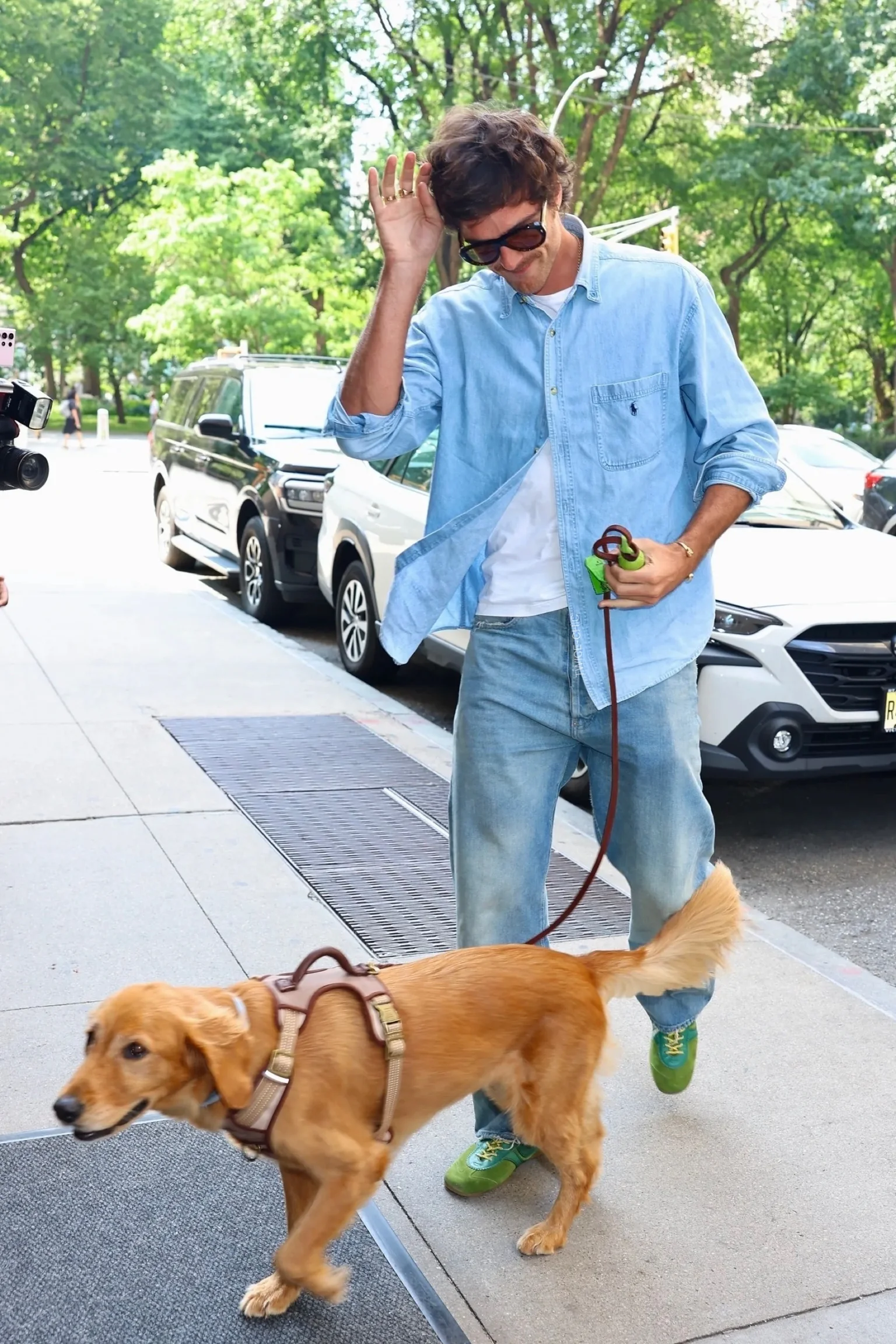 Stylish Man Jacob Elordi. Casual Denim Layers with a Pop of Green Sneakers for a Relaxed Look